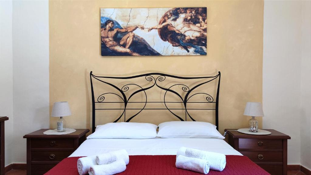 A bed or beds in a room at Ruggero House
