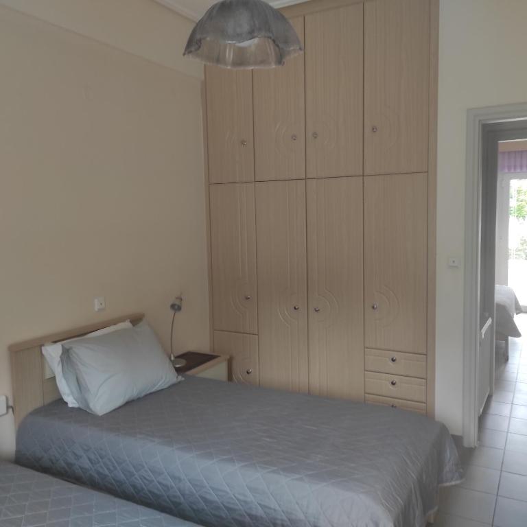 Postel nebo postele na pokoji v ubytování Sea Breeze Villa