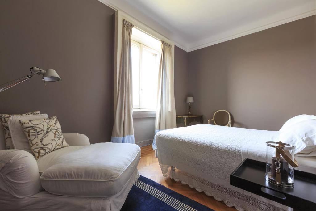 Łóżko lub łóżka w pokoju w obiekcie Pattini Guest House