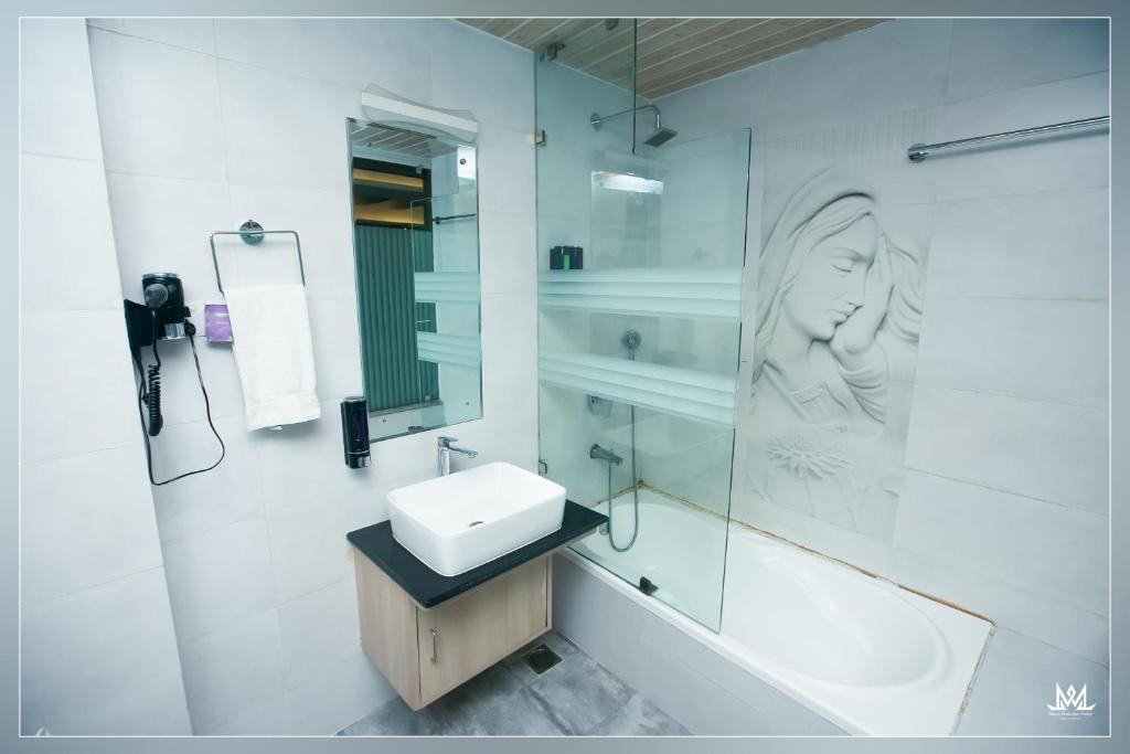 Koupelna v ubytování Hotel Maya Boutique & Apartment