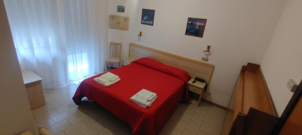 Postel nebo postele na pokoji v ubytování Hotel K2