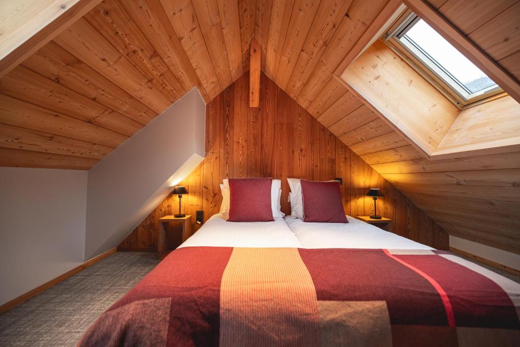 Postel nebo postele na pokoji v ubytování Alliey & Spa Piscine Appart-hôtel Serre chevalier