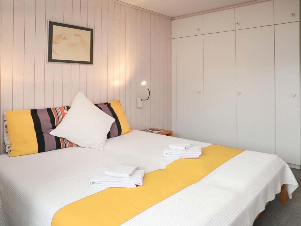 Letto o letti in una camera di Apartment Arlette Nr- 34 by Interhome