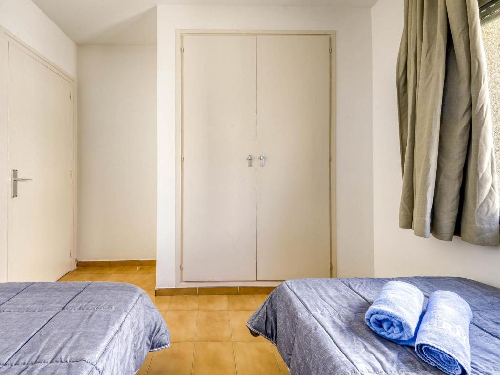 Posteľ alebo postele v izbe v ubytovaní Apartment Mismar-7 by Interhome