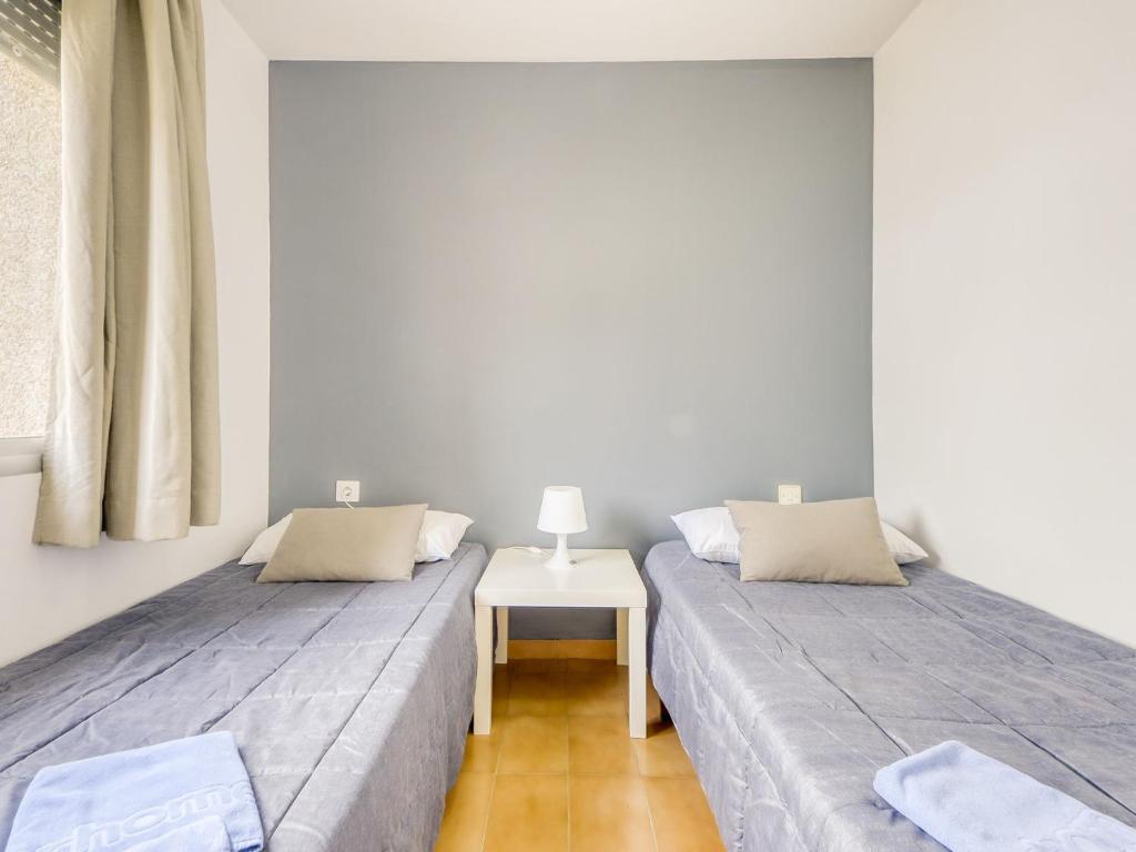 Postel nebo postele na pokoji v ubytování Apartment Mismar-1 by Interhome