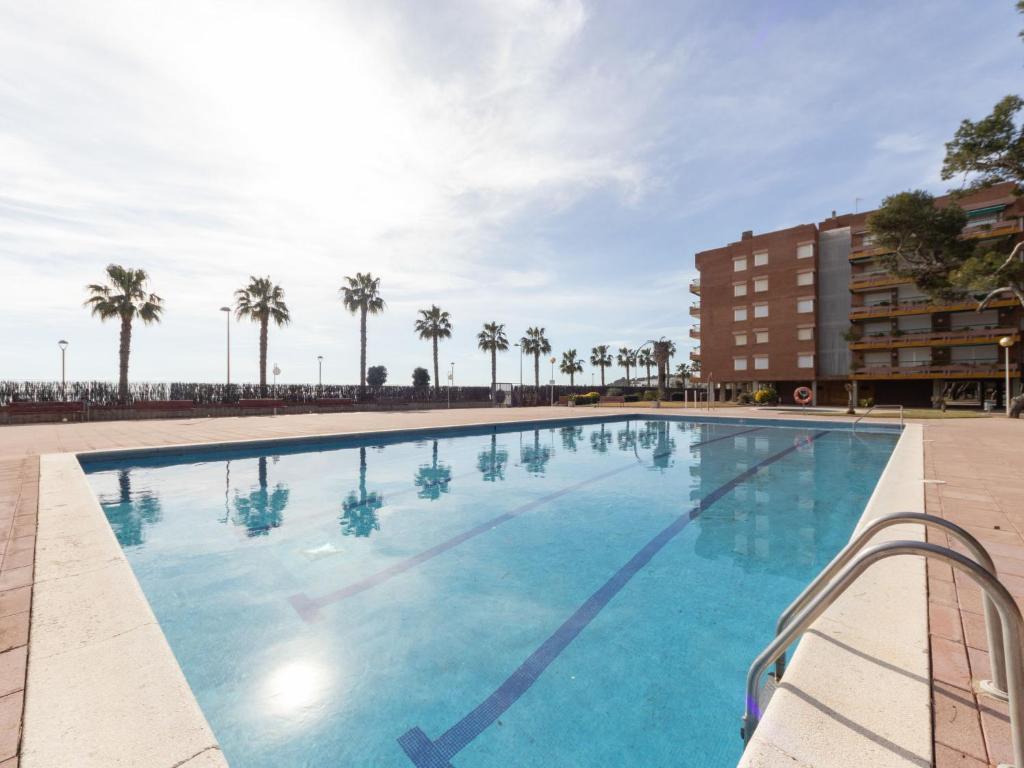 The swimming pool at or close to Apartment Els Pins Eduardo-7 by Interhome