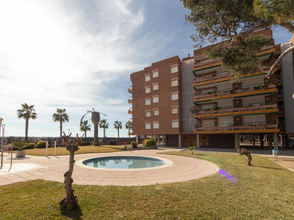 The swimming pool at or close to Apartment Els Pins Eduardo-7 by Interhome