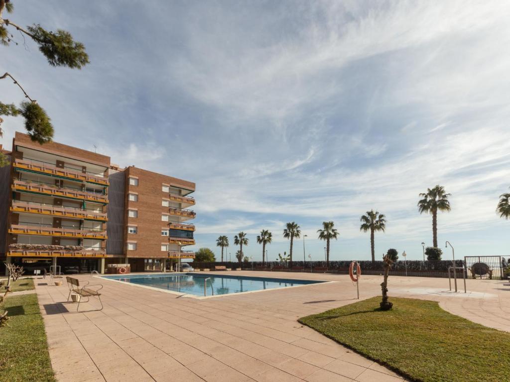 The swimming pool at or close to Apartment Els Pins Eduardo-7 by Interhome