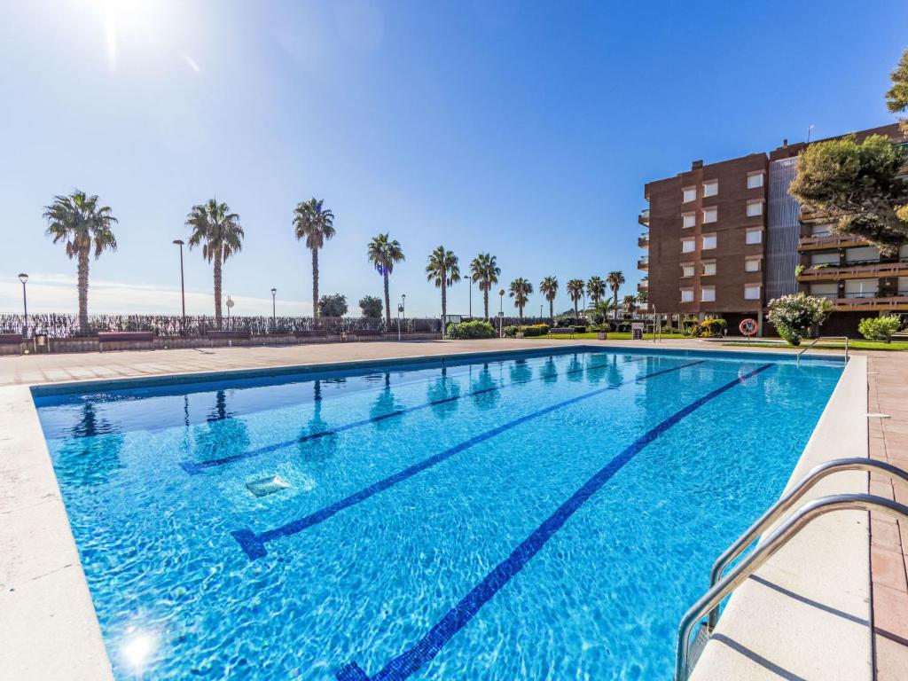 The swimming pool at or close to Apartment Els Pins Eduardo-7 by Interhome