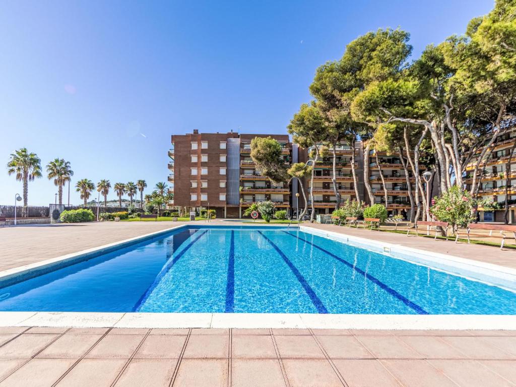 The swimming pool at or close to Apartment Els Pins Eduardo-7 by Interhome