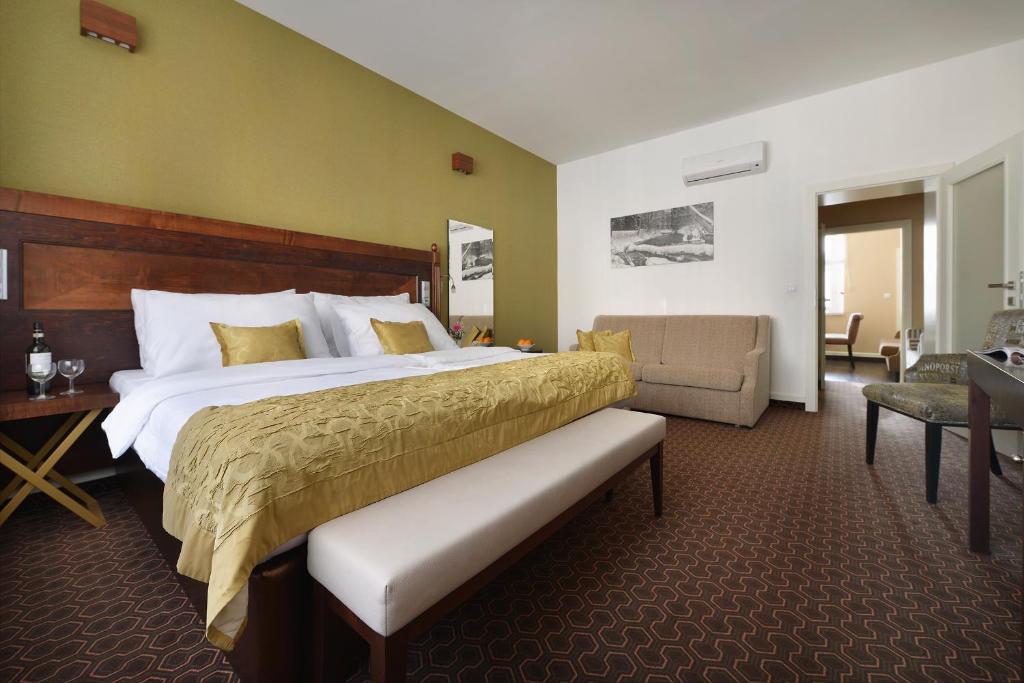 Łóżko lub łóżka w pokoju w obiekcie Vysocina Design Apartments