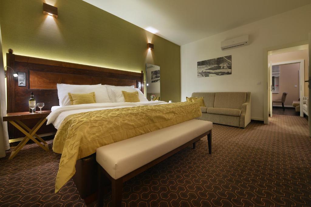 Łóżko lub łóżka w pokoju w obiekcie Vysocina Design Apartments