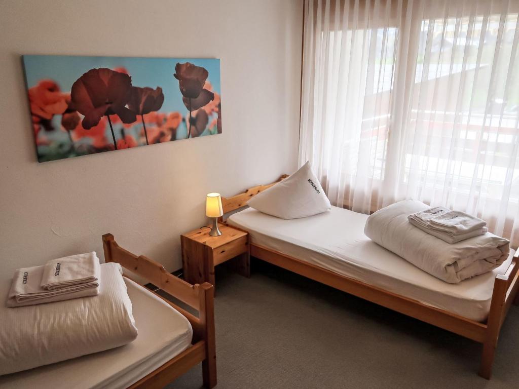 Postel nebo postele na pokoji v ubytování Apartment Apt D 045 by Interhome