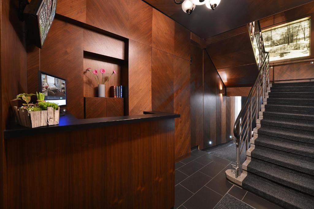 Telewizja i/lub zestaw kina domowego w obiekcie Vysocina Design Apartments
