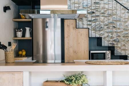 Kuchyň nebo kuchyňský kout v ubytování Cal Rus Apartament 3
