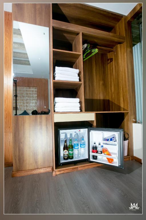 Kuchyň nebo kuchyňský kout v ubytování Hotel Maya Boutique & Apartment