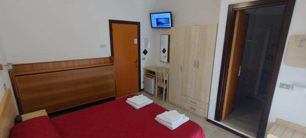 Postel nebo postele na pokoji v ubytování Hotel K2