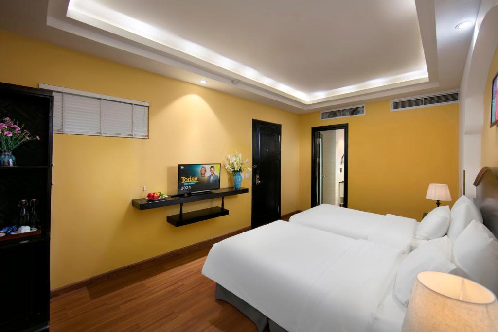 TV a/nebo společenská místnost v ubytování Hanoi Harmonia Hotel & Spa
