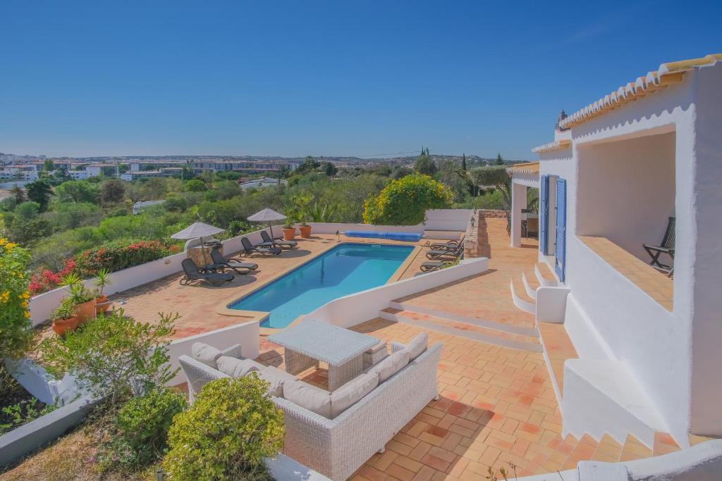 an image of a villa with a swimming pool at Casa Montaza 4 Bedroom Villa with private pool in Lagos in Lagos
