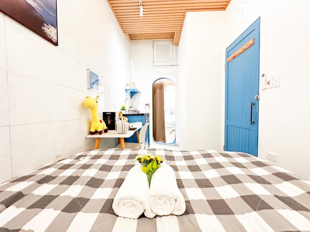 Postel nebo postele na pokoji v ubytování La Casa Di Dicembre Trần Hưng Đạo