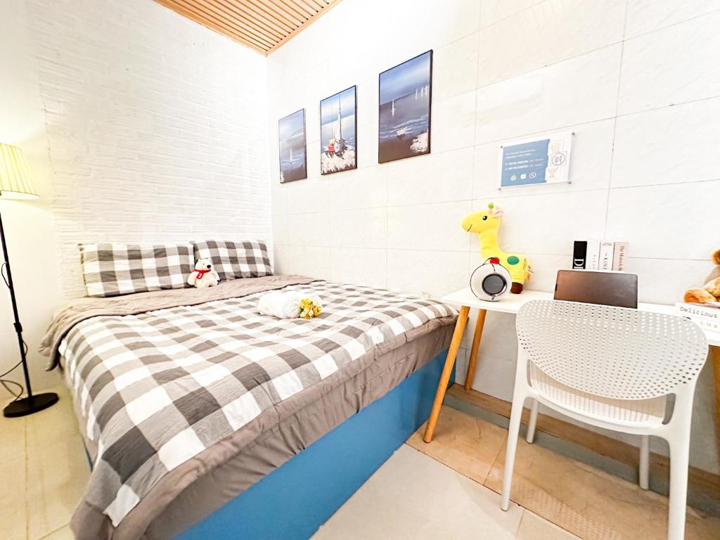 Postel nebo postele na pokoji v ubytování La Casa Di Dicembre Trần Hưng Đạo