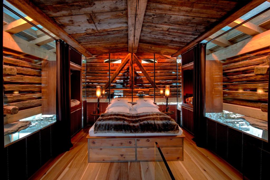 Postel nebo postele na pokoji v ubytování Luxury Loft by Heinz Julen