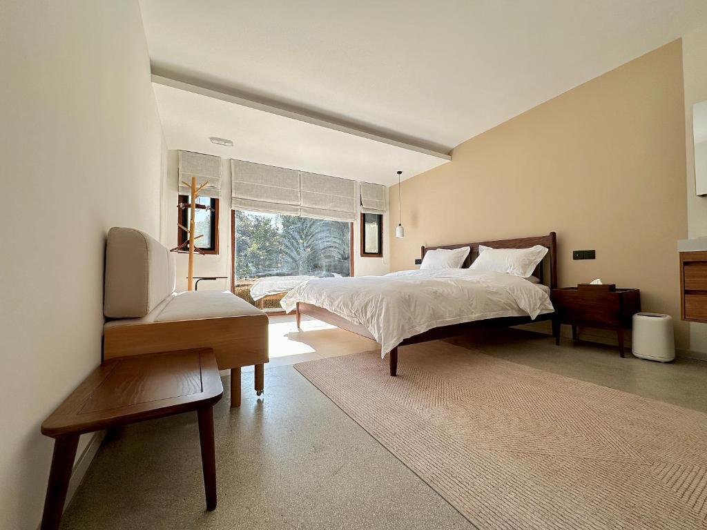 Postel nebo postele na pokoji v ubytování Hangzhou XianQingShan Homestay Westlake