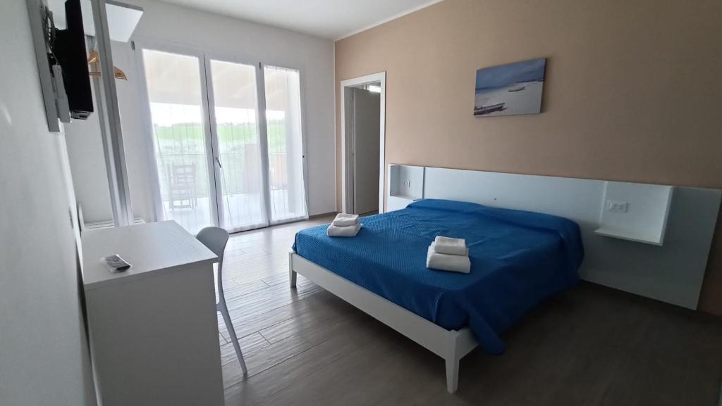 Postel nebo postele na pokoji v ubytování B&B San Lorenzo