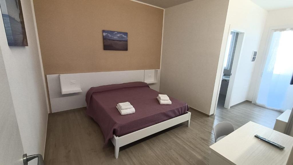 Postel nebo postele na pokoji v ubytování B&B San Lorenzo