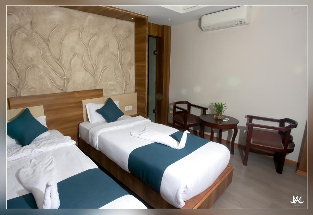 Postel nebo postele na pokoji v ubytování Hotel Maya Boutique & Apartment