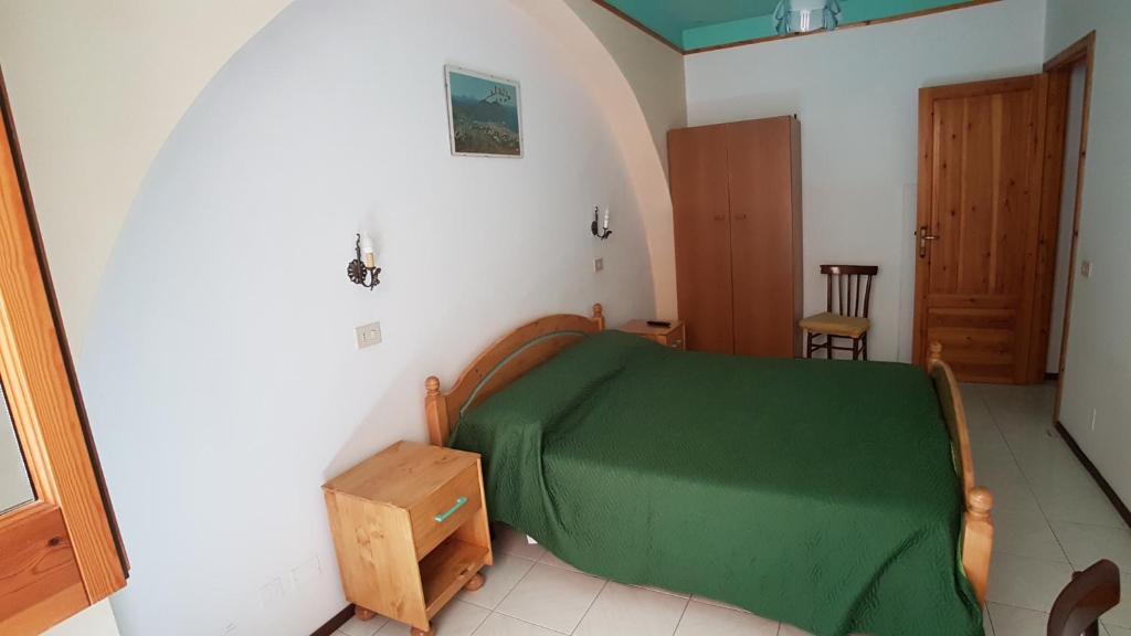 Postel nebo postele na pokoji v ubytování Casa Vittorio B&b
