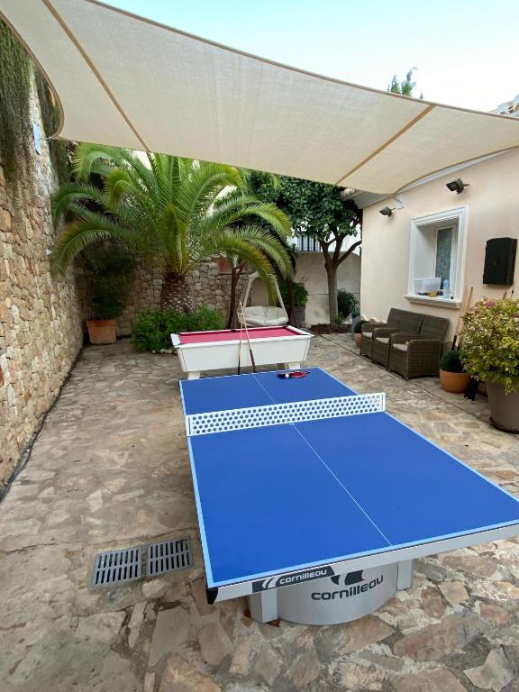 Stolní tenis v ubytování Villa Jannine nebo okolí