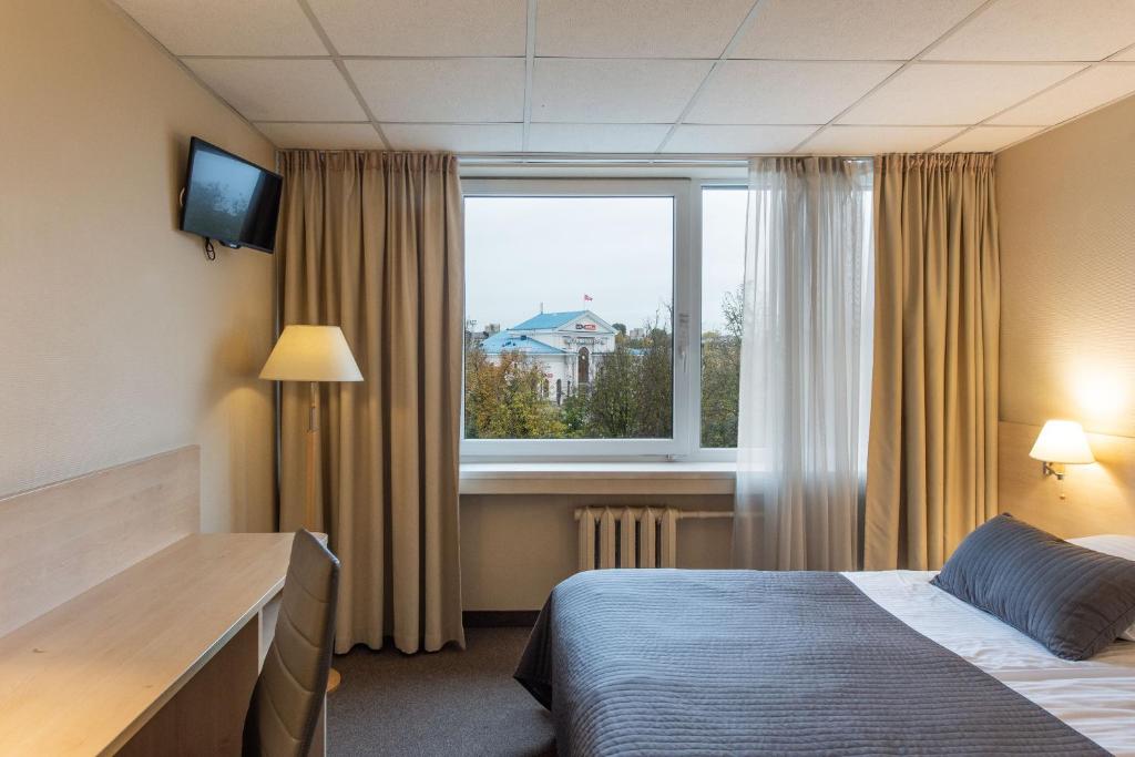 Postel nebo postele na pokoji v ubytování Hotel Panorama