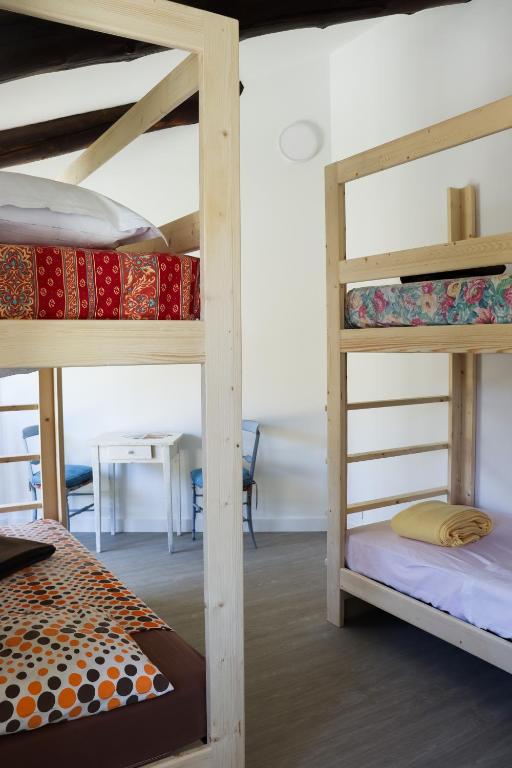 Postel nebo postele na pokoji v ubytování Gîte de l'Escanson un temps pour soi