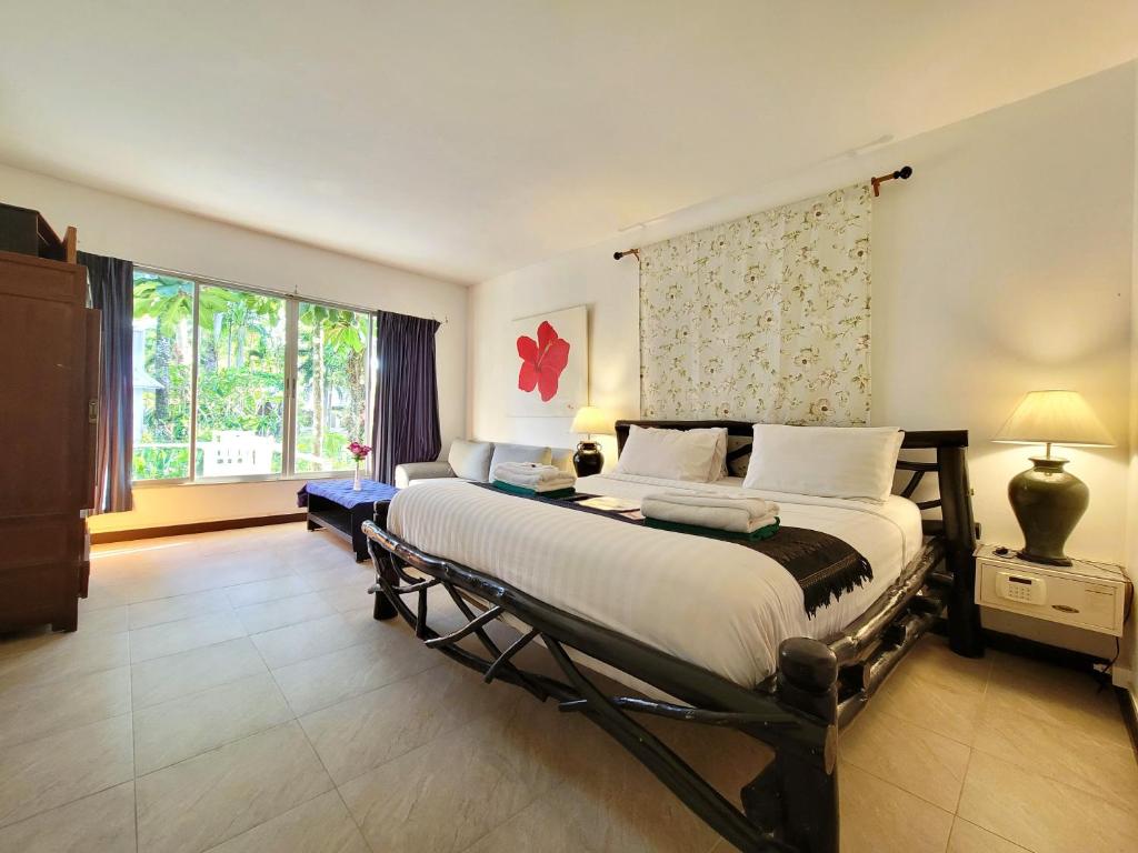 Кровать или кровати в номере Koh Chang Cliff Beach Resort