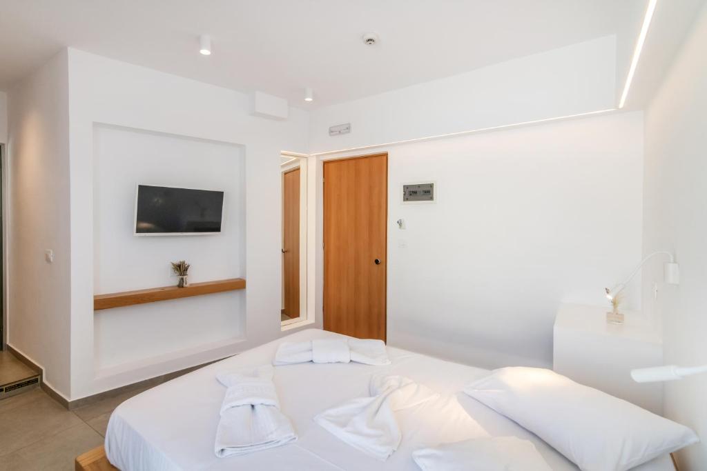 Postel nebo postele na pokoji v ubytování Ageri Hotel