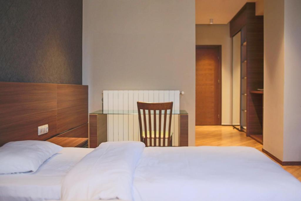 Postel nebo postele na pokoji v ubytování Nina Palace Hotel