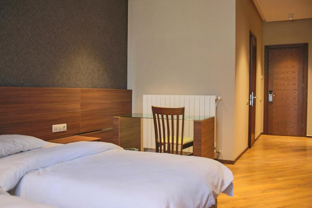 Postel nebo postele na pokoji v ubytování Nina Palace Hotel
