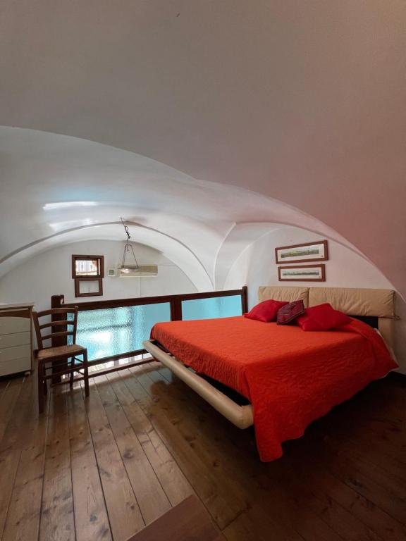 A bed or beds in a room at Il ponte di vetro House