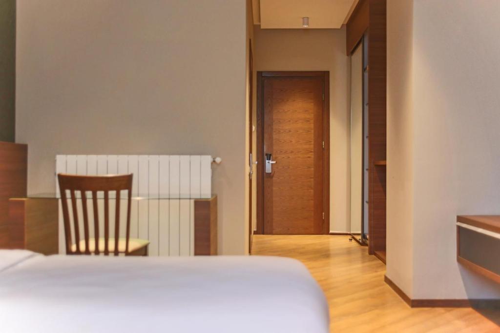 Postel nebo postele na pokoji v ubytování Nina Palace Hotel
