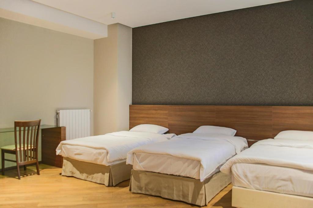 Postel nebo postele na pokoji v ubytování Nina Palace Hotel