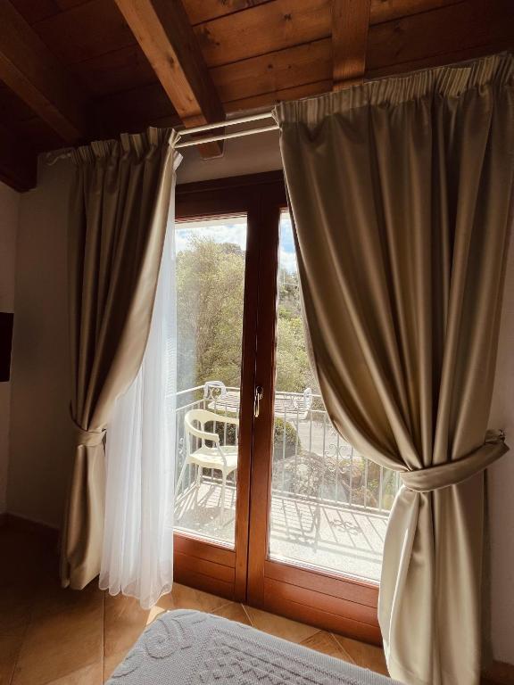Postel nebo postele na pokoji v ubytování Hotel La Borgata
