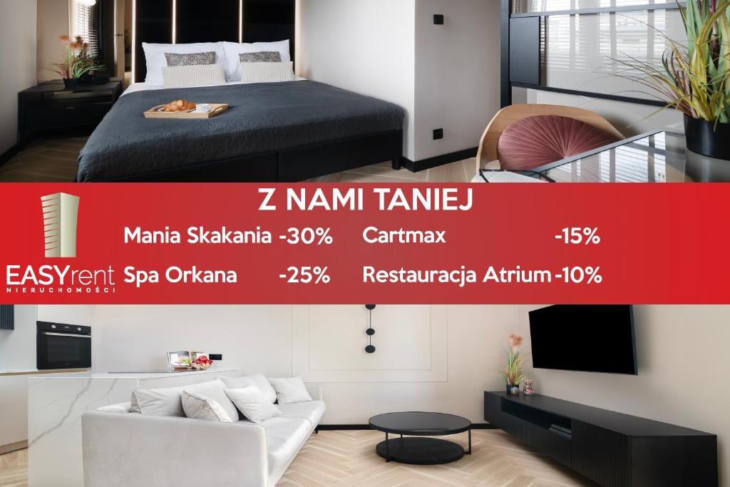 un letto a baldacchino per una camera d'albergo con letto e TV di EASY RENT Apartments- CityCenter Place a Lublino