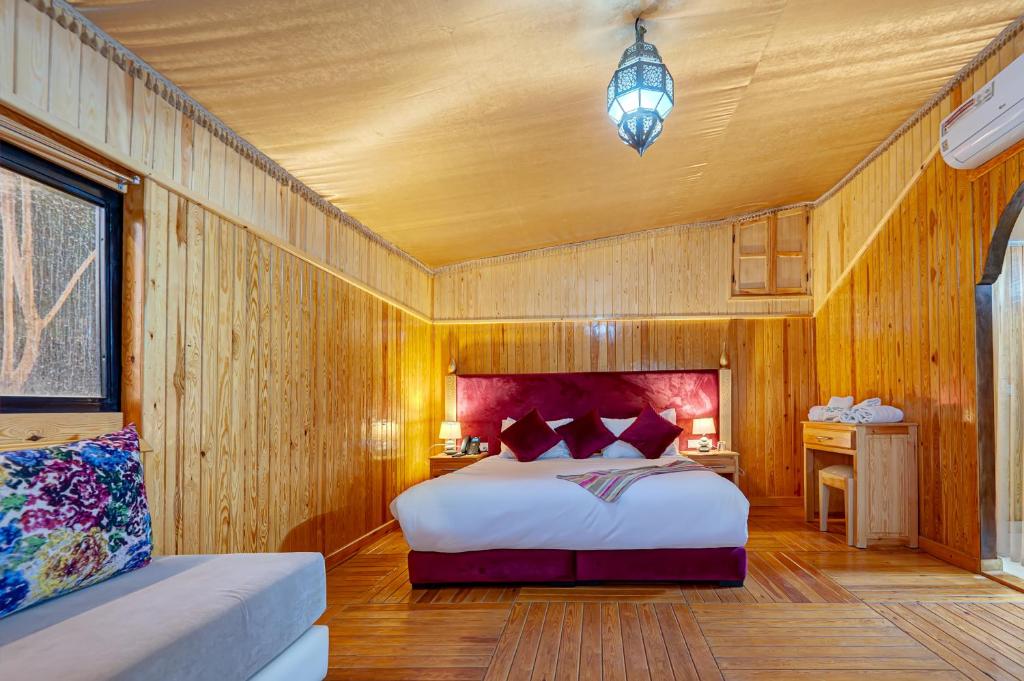 Postel nebo postele na pokoji v ubytování Ferme Sidi Safou & Spa