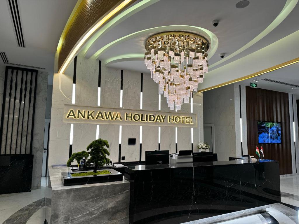 Lobby o reception area sa Ankawa Holiday Hotel