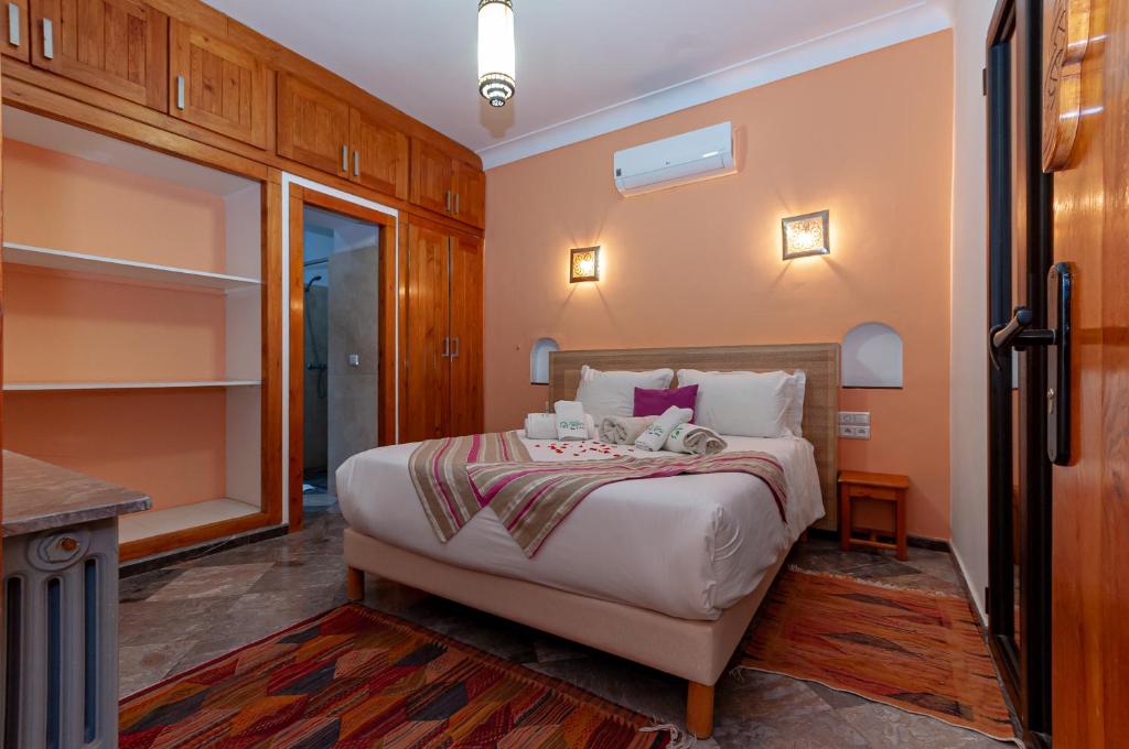 Postel nebo postele na pokoji v ubytování Ferme Sidi Safou & Spa
