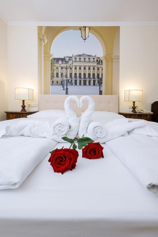 Posteľ alebo postele v izbe v ubytovaní Hotel Royal