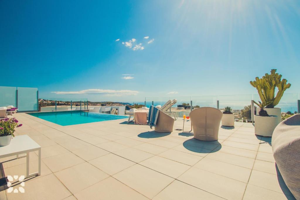 Bazén v ubytování Villa Aguamarina by Abahana Villas nebo v jeho okolí