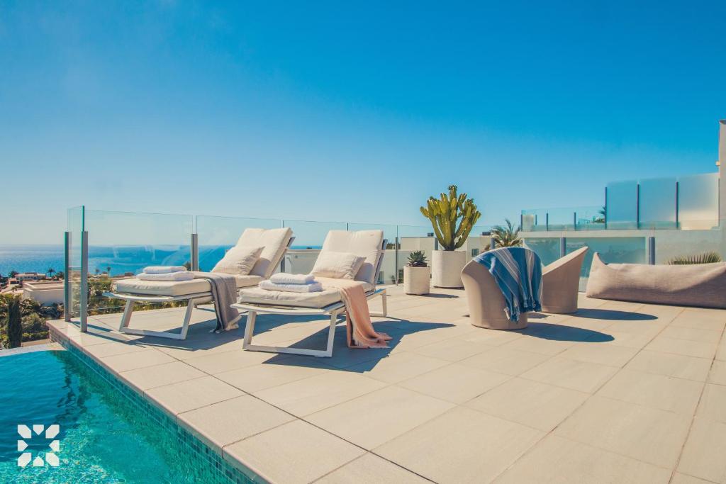 Bazén v ubytování Villa Aguamarina by Abahana Villas nebo v jeho okolí