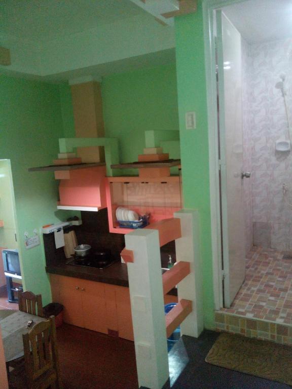 Kuchyň nebo kuchyňský kout v ubytování Gomez Guest House